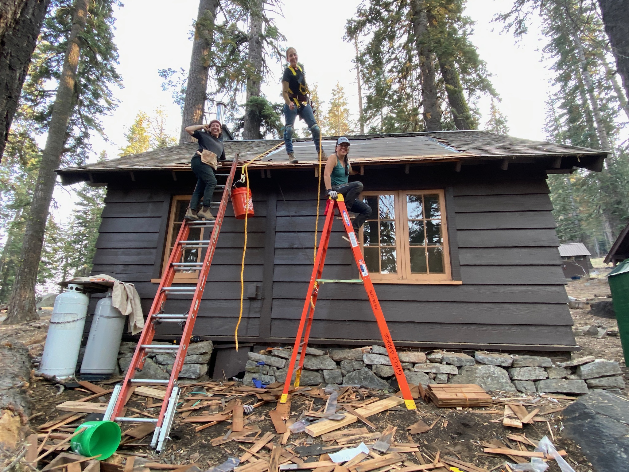 Girls Garage Staff repairs a roof in Yosemite