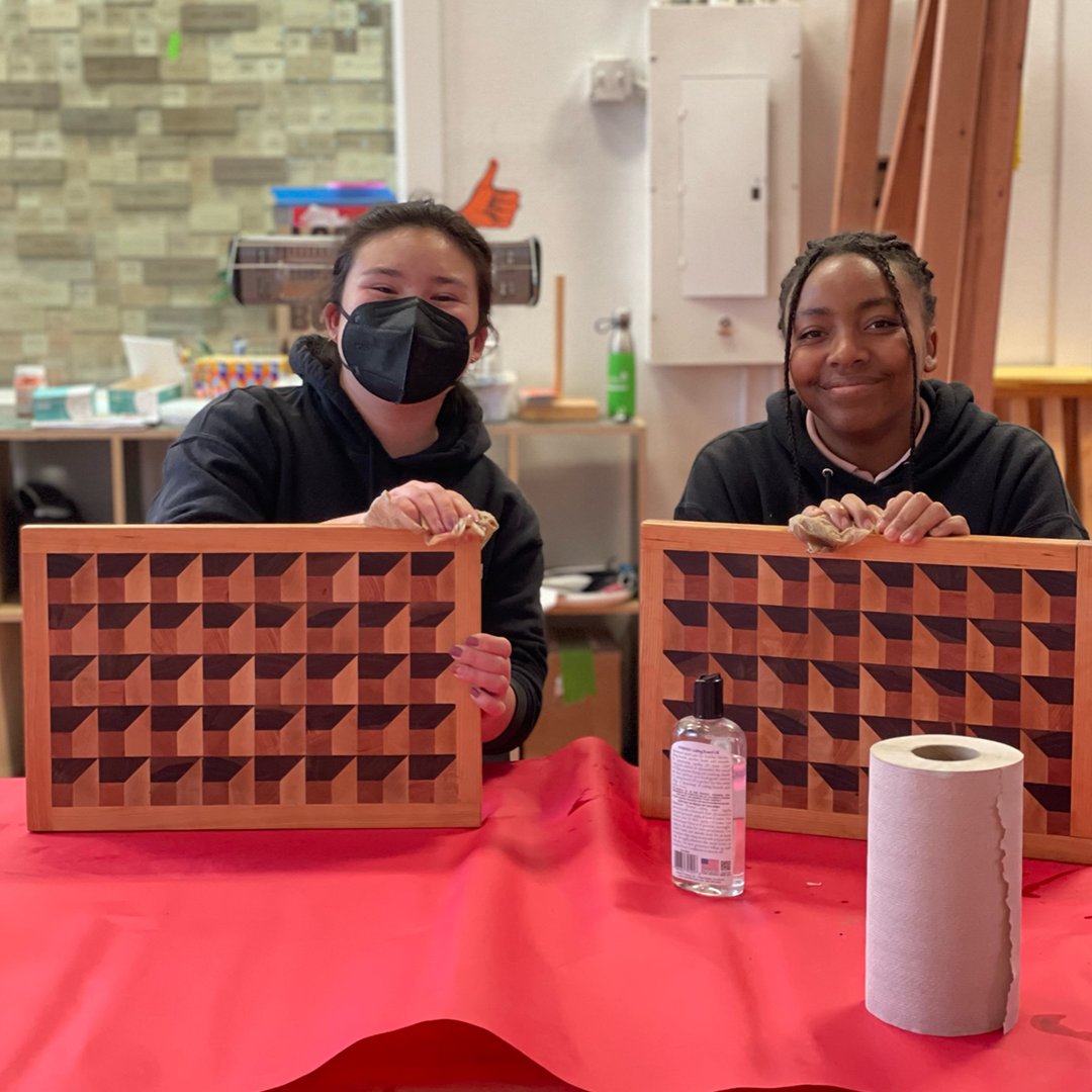 Students with cutting boards
