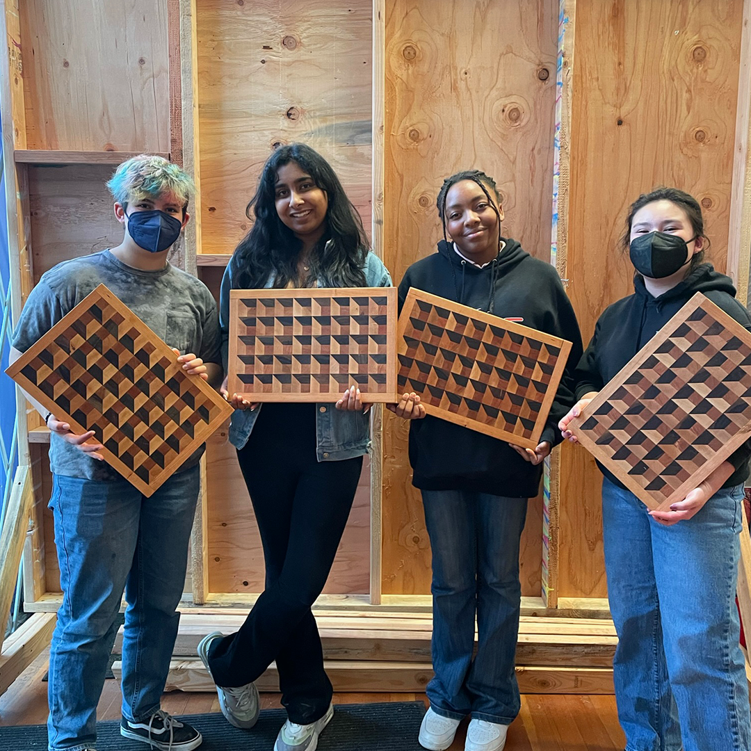 Students with cutting boards