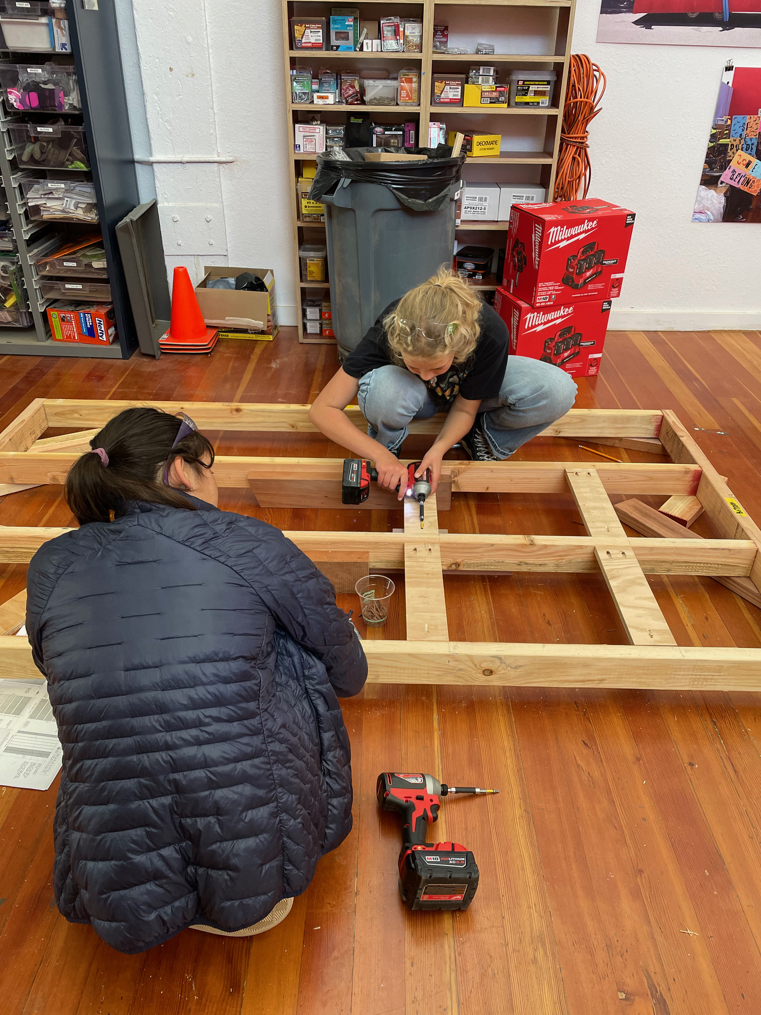 Girls Garage teens framing sauna walls